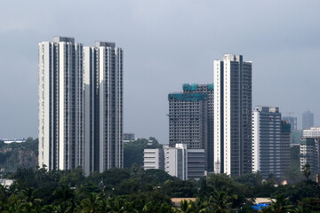 A skyline of modern concrete high rise skyscrapers in the suburb of Kandivali East in the city of Mumbai.