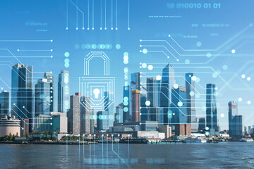 New York City skyline from New Jersey over the Hudson River towards the Hudson Yards at day. Manhattan, Midtown. The concept of cyber security to protect confidential information, padlock hologram