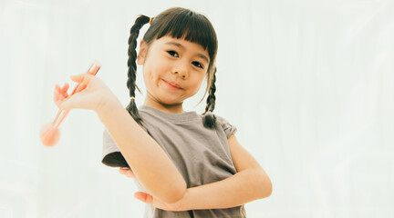 Young superstar asian make up artist : Portrait attractive little female model beautiful poses...