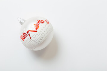 red and white christmas ball on white background