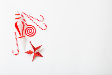 red and white christmas decorations on white  background