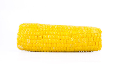 The peeled ear of corn, a piece of and seeds on a white, isolated.