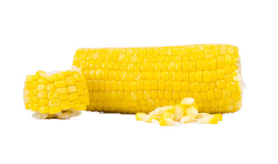 The peeled ear of corn, a piece of and seeds on a white, isolated.