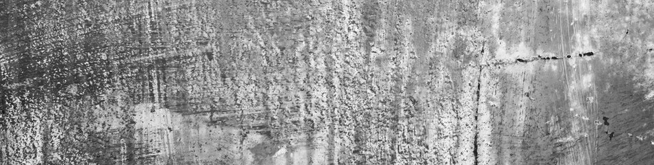 Black white grunge texture. Old scratched metal. Damaged gray steel background with copy space for design. Web banner. Website header. Panoramic.	
