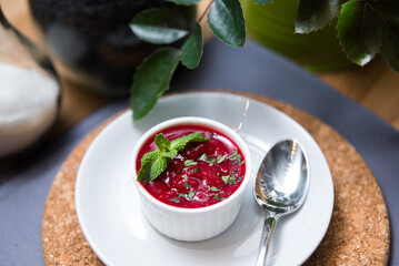 Melted berries sorbet in ramekin. One portion.