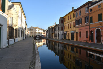 Fototapeta na wymiar Morning view of empty canals in Comacchio near Venice in Italy