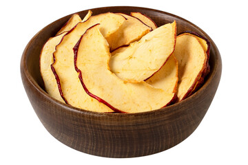 Dried apple slices in a brown wood bowl isolated.