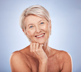 Skincare, anti aging and beautiful mature woman with smile on her face on studio background....