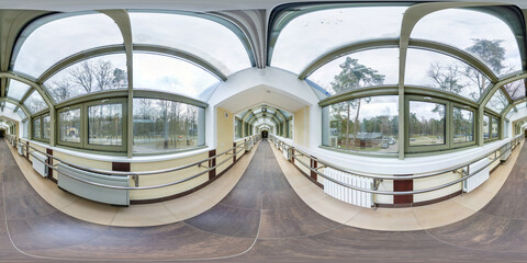 360 seamless hdri panorama view inside empty long corridor hall between buildings with transparent...