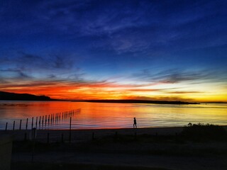 Obraz na płótnie Canvas sunset over the beach