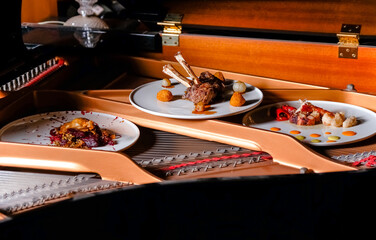 Assorted dishes on the piano