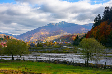 Fototapeta na wymiar joint of tereblya and bradolets river. mountainous countryside scenery in autumn