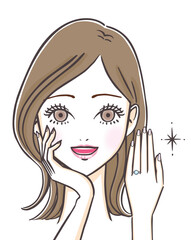 婚約指輪を見せながら笑顔で微笑む若い女性