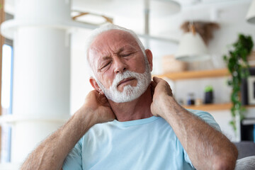 Senior elderly man touching his neck, suffering from neck pain, sciatica, sedentary lifestyle...