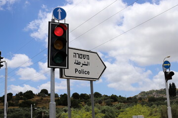 Road information sign installed on the side of the road in Israel.