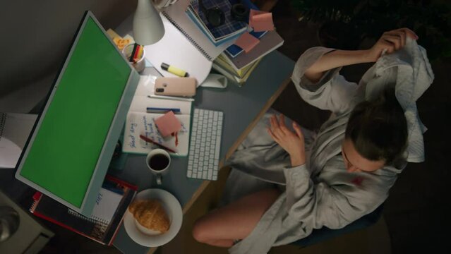 Disconcerted woman getting workplace up top view. Recovering girl removing towel