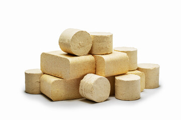 Different fuel briquettes isolated on white.