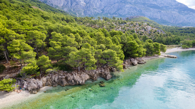 Seaside with turquoise bay and beach in Plaža za pse Ramova, Croatia