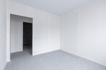 Empty concrete commercial space without finishing with partitions