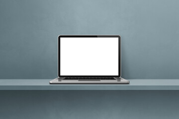 Laptop computer on grey shelf background