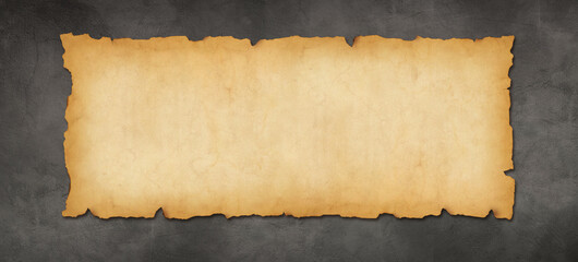 Old paper horizontal banner. Parchment scroll on a concrete wall
