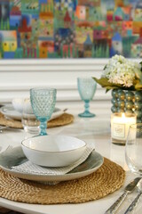 Closeup of table setting on a white table