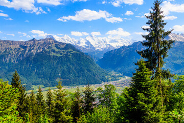 Obraz premium Breathtaking aerial view of Interlaken and Swiss Alps from Harder Kulm viewpoint, Switzerland