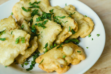 The Mendoans, a traditional food from soybean with flour, served in white plate