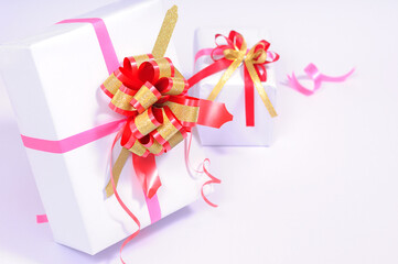 Gift boxes on the white background, high-key