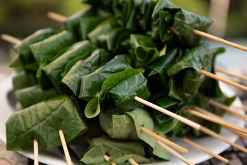grilled minced beef wrapped in betel leaf, vietnamese cuisine, thit bo nuong la lot