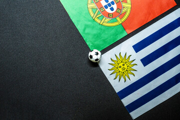 FIFA World Cup Qatar 2022 Football match with national flags. Group H Portugal vs Uruguay