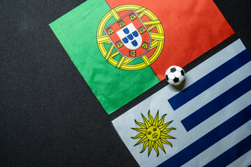 FIFA World Cup Qatar 2022 Football match with national flags. Group H Portugal vs Uruguay