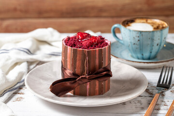 Raspberry cake on rustic wooden background. Bakery products. close up
