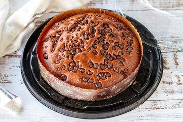 Chocolate cake on rustic wooden background. Bakery products. close up