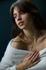 Beautiful young brunette woman portrait. indoor shot