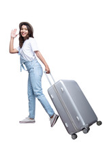 Asian woman with a hat and carrying suitcase