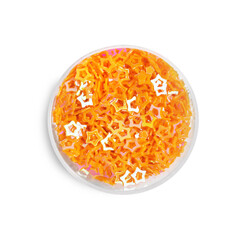 Orange sequins in shape of stars on white background, top view