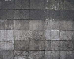 Fondo con detalle y textura de superficie con aplacado de pizarra en tonos grises y negros
