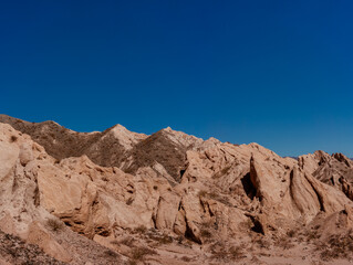 Fototapeta na wymiar Rock formation, Salta, Argentina. The multi-colored geology of the Quebrada de Cafayate. Northwest Argentina