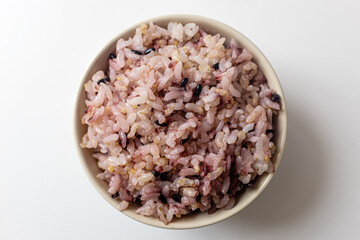Black rice on a white background