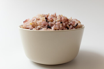 Black rice on a white background