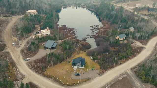 Top View Of Lakefront Holiday Cabins At Saint-Come, Lanaudière, Quebec, Canada. - Drone Shot