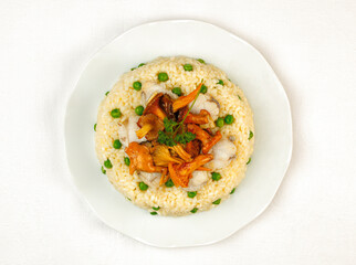 Cooked rice with monkfish and wild mushrooms