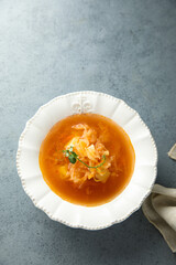 Traditional homemade sauerkraut soup with tomato