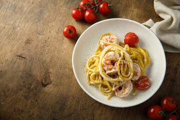 Homemade pasta with shrimps and cream