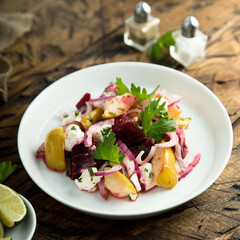 Beetroot salad with apple and goat cheese