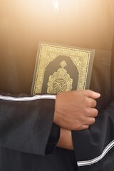 Muslim man reading holy quran. islamic concept