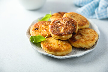 Homemade savory potato pancakes with fresh basil