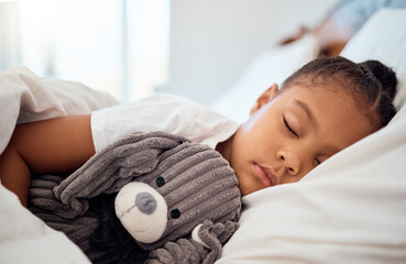 Peace, morning and wellness of black child sleeping in cozy bed with toy teddy in home on the...