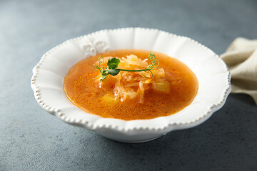 Traditional homemade sauerkraut soup with tomato